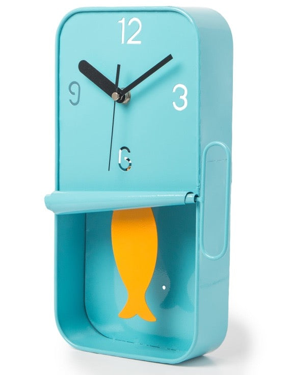 ORANGE METAL SARDINE TIN PENDULUM WALL CLOCK